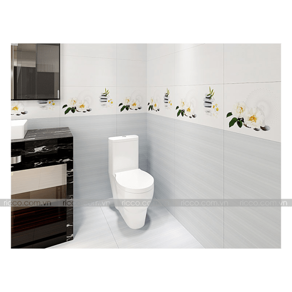 công trình nhà vệ sinh thực tế hoàn thiện sử dụng gạch ốp tường hoàn mỹ 30x60cm Ceramic men bóng trắng xanh mã 2063